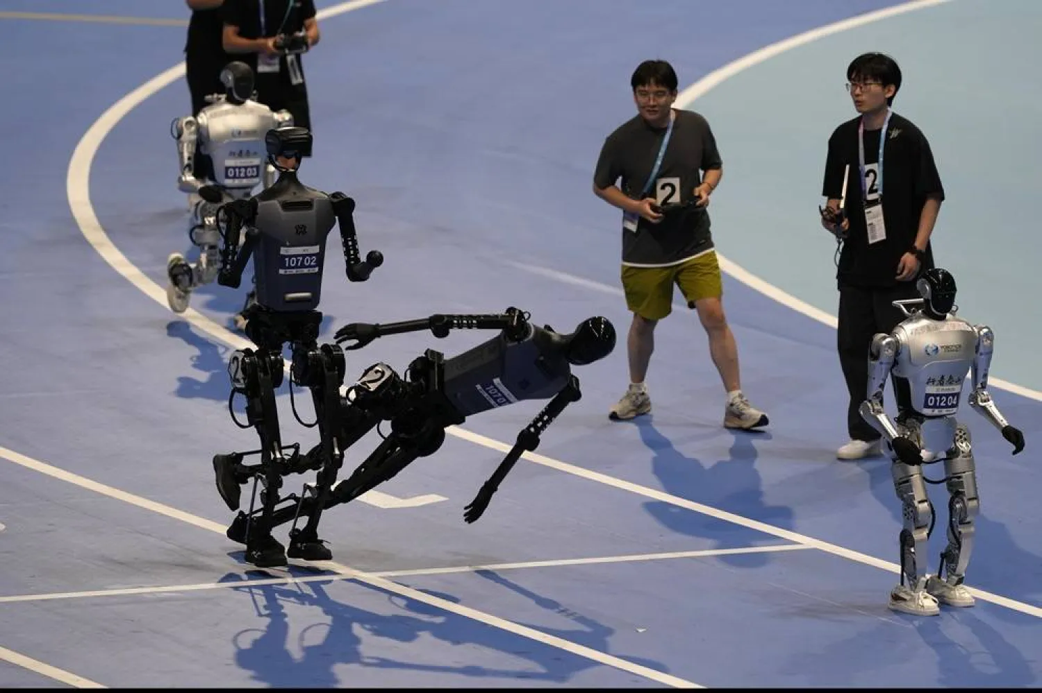 Photos of Beijing’s World Humanoid Robot Games Show How a Human Touch Is Still Needed