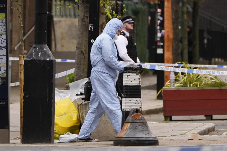 Police hunt gunman after man shot dead in car near Euston station