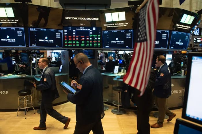 U.S. stocks close higher as Fed decision on interest rate approaches