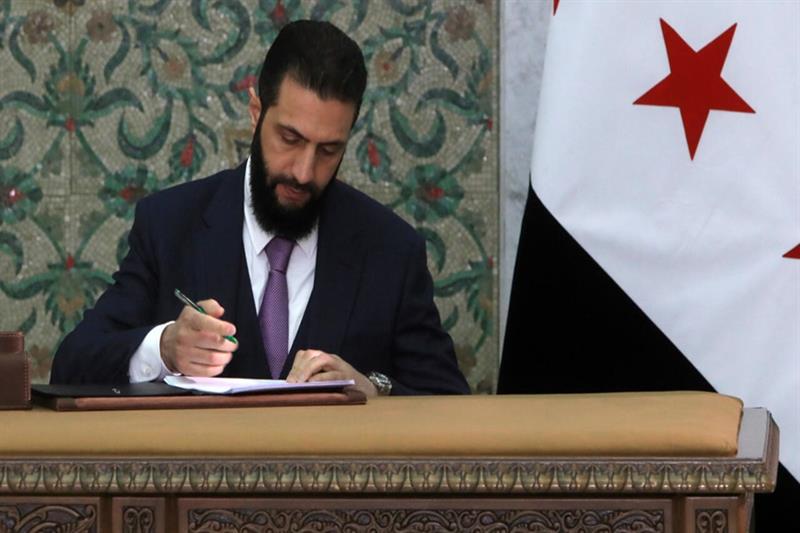 Syria leader signs constitutional declaration, hailing 'new history'