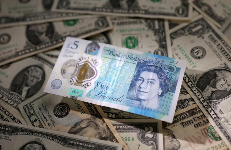 Sterling pares losses after UK wage data