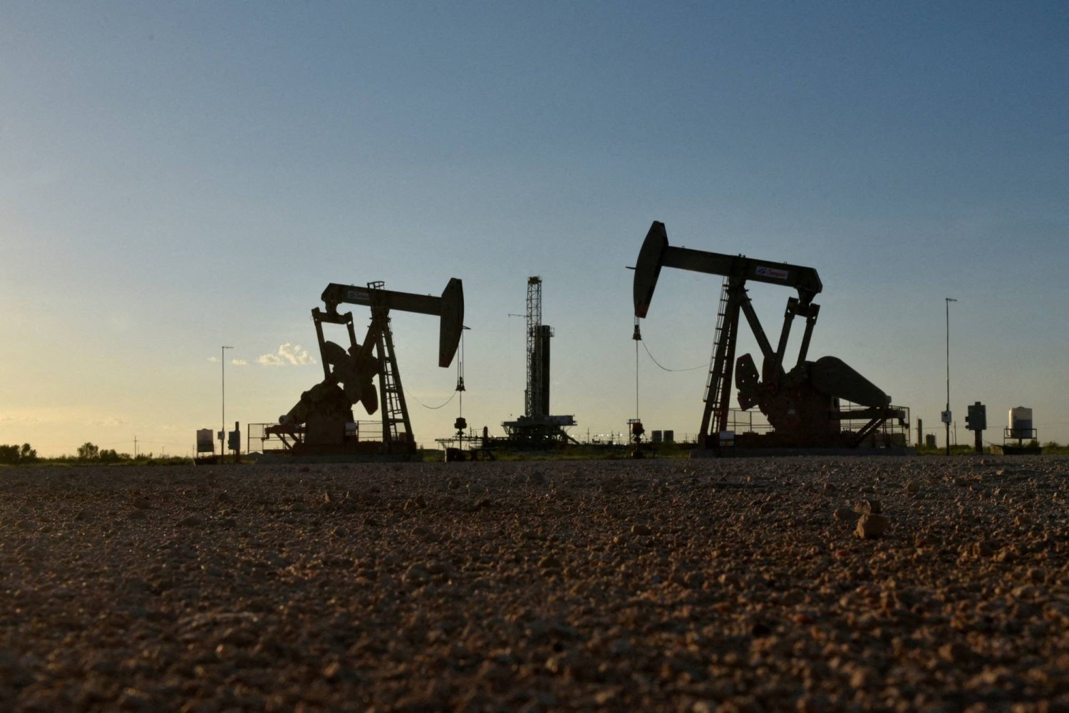 Oil Prices Broadly Flat After Falling On Dollar Surge