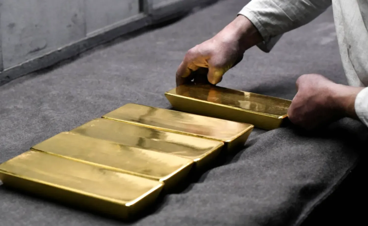Gold Pulls Back from Near 3-month High as Dollar Regains Strength