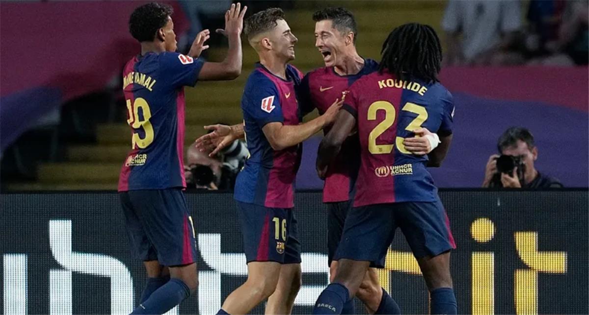 Barca moves second after easy win but Atletico drops more points in La Liga