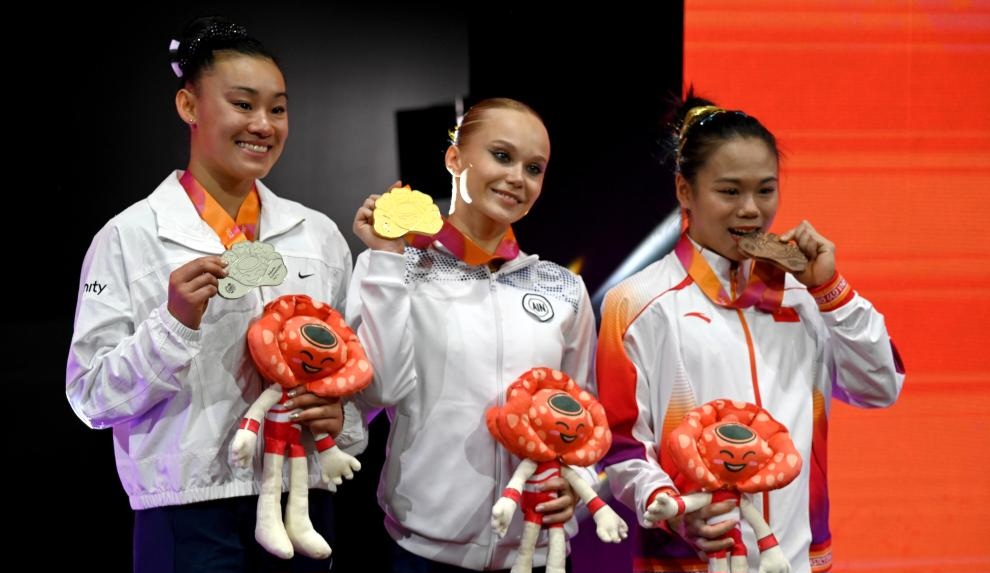 Melnikova wins women's all-around title as China's Zhang takes bronze at Jakarta gymnastics worlds