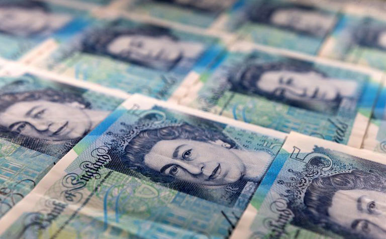 Sterling edges up after stronger UK retail sales