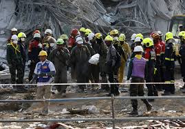 Dozens trapped under rubble after Ukrainian airstrike on residential building in Kherson